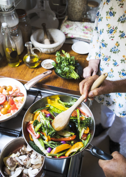 Couple cooking in kitchen